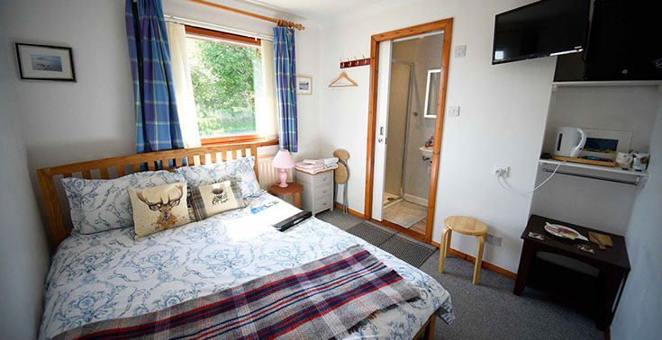 Our bed and breakfast accommodation in Portree contains a double room with en suite shower room and widescreen TV