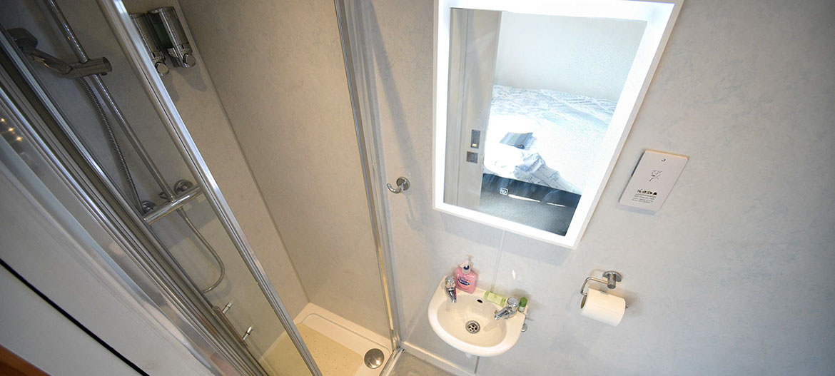 Kenmore Bed and Breakfast accommodation contains an en suite shower room with heated towel rail and anti steam mirror
