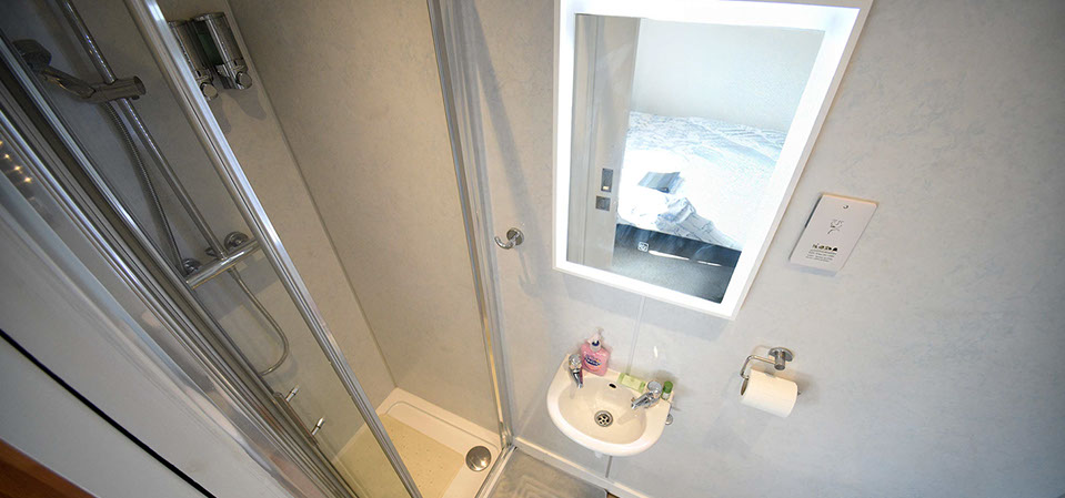 Kenmore Bed and Breakfast accommodation contains an en suite shower room with heated towel rail and anti steam mirror